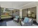 Screened patio area offering comfortable seating and backyard views at 7360 Canal Dr, Sanford, FL 32771