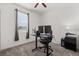 Well lit office area with a window, a ceiling fan, and an office desk at 756 Rioja Dr, Minneola, FL 34715
