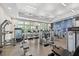 Well-equipped gym with modern fitness machines and a bright, spacious layout at 7778 Four Seasons Blvd, Kissimmee, FL 34747
