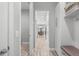 Hallway with built in hall-tree and access to other rooms in the home at 7778 Four Seasons Blvd, Kissimmee, FL 34747