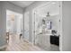 Inviting home office with built-in desk, neutral carpet, and glass French doors at 7778 Four Seasons Blvd, Kissimmee, FL 34747