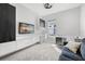 Home office with built-in desk, sleek white cabinets, and ample natural light at 7778 Four Seasons Blvd, Kissimmee, FL 34747