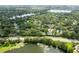 Stunning aerial view of lush neighborhood with lake access and mature trees surrounding residences at 820 Ellwood Ave # A, Orlando, FL 32804