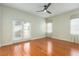 Bedroom featuring hardwood floors, and access to a private patio at 820 Ellwood Ave # A, Orlando, FL 32804