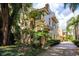 Charming two-story home with stucco exterior, a balcony, and a well-manicured, mature landscape at 820 Ellwood Ave # A, Orlando, FL 32804