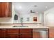 Open kitchen view overlooking the living room and featuring a breakfast bar at 820 Ellwood Ave # A, Orlando, FL 32804
