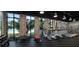 Modern fitness center with treadmills, stationary bikes, weights, and scenic outdoor views at 832 Longboat Dr, Davenport, FL 33896