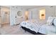 Inviting main bedroom featuring a walk-in closet, en-suite bathroom, and bright natural light at 832 Longboat Dr, Davenport, FL 33896