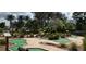Community mini golf course with artificial turf, landscaping, and fun obstacles at 832 Longboat Dr, Davenport, FL 33896