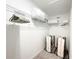Spacious walk-in closet with ample shelving, hanging storage and extra room for storage solutions at 832 Longboat Dr, Davenport, FL 33896