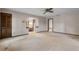 A wide bedroom is carpeted and includes a vanity and doorway to the side at 9601 Ambleside Dr, Windermere, FL 34786