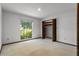 Bright bedroom with a view and large closet at 9601 Ambleside Dr, Windermere, FL 34786