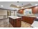 A great kitchen with stainless appliances, tile floors and center island at 9601 Ambleside Dr, Windermere, FL 34786