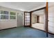 Bright sun room with large windows and double doors offering versatile living and access to the outdoors at 9601 Ambleside Dr, Windermere, FL 34786