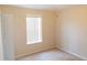 Bedroom showcasing a window for natural light and a closet for storage at 1001 Dampierre Ct, Kissimmee, FL 34759