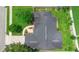 Overhead view of a home with a gray roof and a well-maintained yard at 1003 Jackson Creek Ct, Oviedo, FL 32765