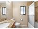 Bathroom with granite vanity, toilet, and tiled shower with sliding glass door at 1003 Jackson Creek Ct, Oviedo, FL 32765