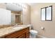 Bathroom with granite vanity and tiled shower with a glass door at 1003 Jackson Creek Ct, Oviedo, FL 32765