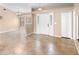 Bright living room with tiled flooring, neutral walls, and ample natural light from large windows at 1003 Jackson Creek Ct, Oviedo, FL 32765