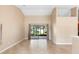 Spacious living room with sliding glass doors to the porch, offering indoor-outdoor flow at 1003 Jackson Creek Ct, Oviedo, FL 32765