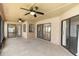 Covered patio features multiple sliding glass doors to enter the house at 1003 Jackson Creek Ct, Oviedo, FL 32765