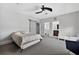 Spacious bedroom featuring light carpet, neutral walls, and ample natural light at 11015 Hawkshead Ct, Windermere, FL 34786