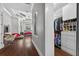 Hallway view to the modern bedroom and the open closet space at 11015 Hawkshead Ct, Windermere, FL 34786