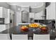 Bright kitchen featuring white cabinets and countertops plus stainless steel appliances at 11015 Hawkshead Ct, Windermere, FL 34786