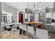 Bright and airy kitchen with an island bar, stainless appliances, and access to breakfast nook at 11015 Hawkshead Ct, Windermere, FL 34786