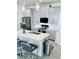 Stylish kitchen island with barstool seating and a stainless steel sink at 11408 Satire St, Orlando, FL 32832
