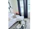 Cozy living room with a comfortable white sofa, accent pillows, and modern decor at 11408 Satire St, Orlando, FL 32832