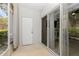 Enclosed patio area with sliding glass doors and separate entry, offering indoor-outdoor living at 1178 Vineland Pl, Lake Mary, FL 32746