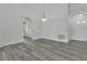 Open concept living room showcasing the new floors and neutral walls at 1406 Sean Ct, St Cloud, FL 34772