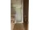 Bathroom showcasing a vanity with a sink, toilet, and a glass shower enclosure at 1524 Conway Ct, The Villages, FL 32162