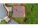 This aerial showcases the red roof, manicured lawn, and boundary lines of the beautiful property at 15344 Johns Lake Pointe Blvd, Winter Garden, FL 34787