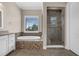 Well-appointed bathroom featuring a soaking tub and walk-in shower at 15344 Johns Lake Pointe Blvd, Winter Garden, FL 34787