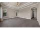 Expansive bedroom with recessed lighting and neutral tones for a serene atmosphere at 15344 Johns Lake Pointe Blvd, Winter Garden, FL 34787