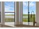 Kitchen featuring a scenic view of the lake and surrounding nature at 15344 Johns Lake Pointe Blvd, Winter Garden, FL 34787