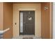 Close up of front door with stylish wreath on a well-maintained home at 1575 Downy Birch Ln, Longwood, FL 32750