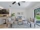 Cozy living room with natural light, stylish decor, and neutral color palette, perfect for relaxing or entertaining at 1575 Downy Birch Ln, Longwood, FL 32750