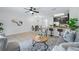 Inviting living room connected to the kitchen and dining area at 1575 Downy Birch Ln, Longwood, FL 32750
