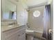 This bathroom is equipped with a shower-tub combination and modern fixtures at 1662 Canoe Creek Rd, Oviedo, FL 32766