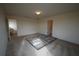 Spacious bedroom with neutral carpet, two entryways, and ample natural light, creating a versatile space at 208 Oleander St, Winter Haven, FL 33881