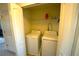 Laundry room featuring side-by-side washer and dryer inside of a closet at 208 Oleander St, Winter Haven, FL 33881