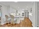 Bright, modern kitchen with white cabinets, marble countertops, and stainless steel appliances at 2112 Fosgate Dr, Winter Park, FL 32789