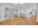Bright living space with an open floor plan connecting the living room and kitchen at 2112 Fosgate Dr, Winter Park, FL 32789