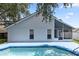 Backyard view featuring an inviting pool and a screened lanai area at 222 Imperial Ridge Ct, Oviedo, FL 32765