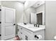 Bathroom featuring double sinks, quartz countertop, and modern fixtures and hardware at 23430 Sw Neptune Blvd, Dunnellon, FL 34431