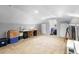 Spacious bonus room with neutral carpet and lighting offers versatility for various activities and storage at 244 N Leavitt Ave, Orange City, FL 32763