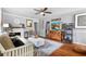Relaxing living room with hardwood floors, modern decor, and an elegant fireplace at 244 N Leavitt Ave, Orange City, FL 32763